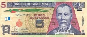 A Guatemalan 5-Quetzal note, showing the bird in flight.