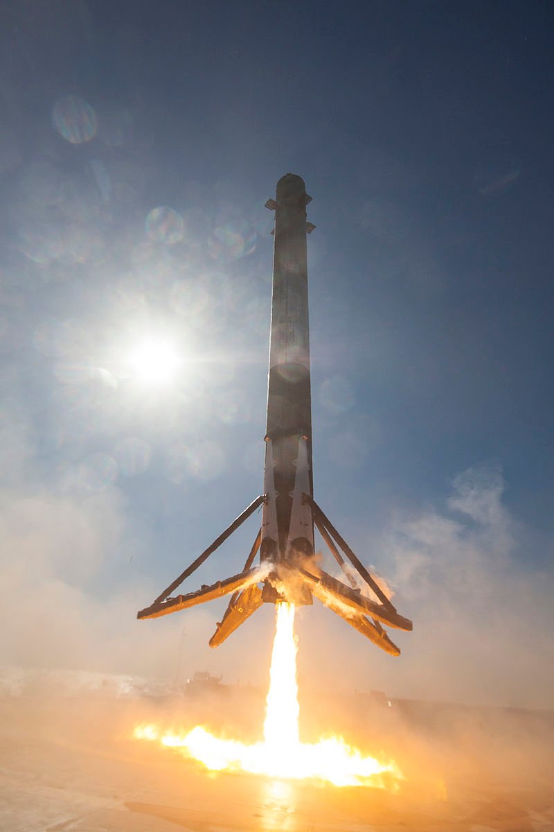 A Falcon 9 booster landing on a drone recovery ship after completing a successful launch. c/o wikicommons.