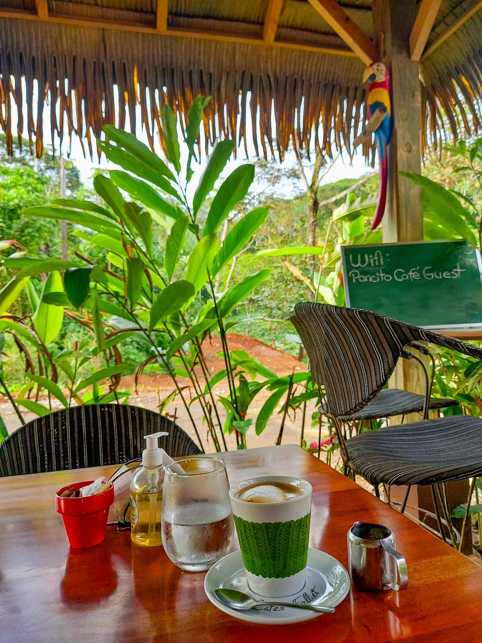 Enjoying a hot cup in Ojochal's Pancito Cafe, located in Plaza Ventanas.