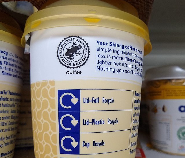 A single-use coffee cup certified by the Rainforest Alliance. c/o RachelY38, wikicommons.