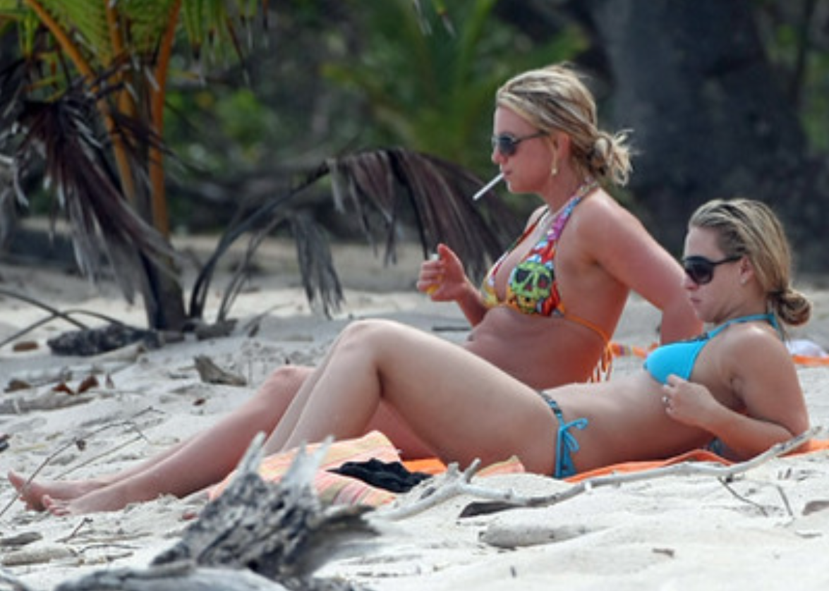 Brittney Spears & a friend, on a holiday to Mel Gibson's estate, relaxing on Costa Rica's Playa Barrigona. c/o www.splashnews.com