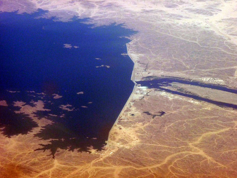 When a lighter-surface is flooded, the reservoir will contribute to the heating of the earth's surface. c/o Lubumbashi, wikicommons.