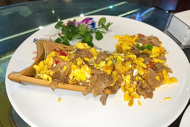 A Chinese dish - scrambled eggs and Phallus mushrooms. c/o N509FZ, wikicommons.