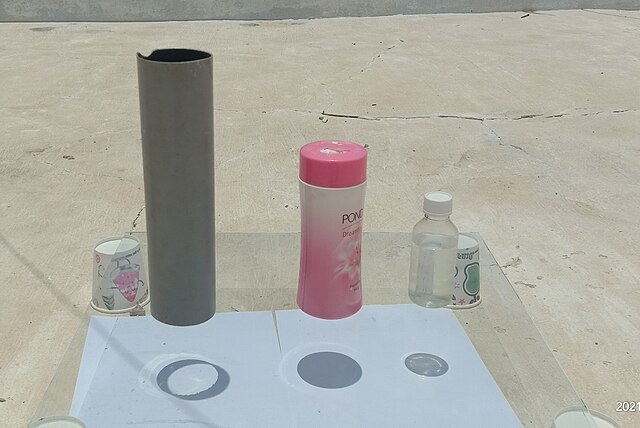 A Zero Shadow Day experiment showing vertical shadows directly underneath objects. <yoastmark class=