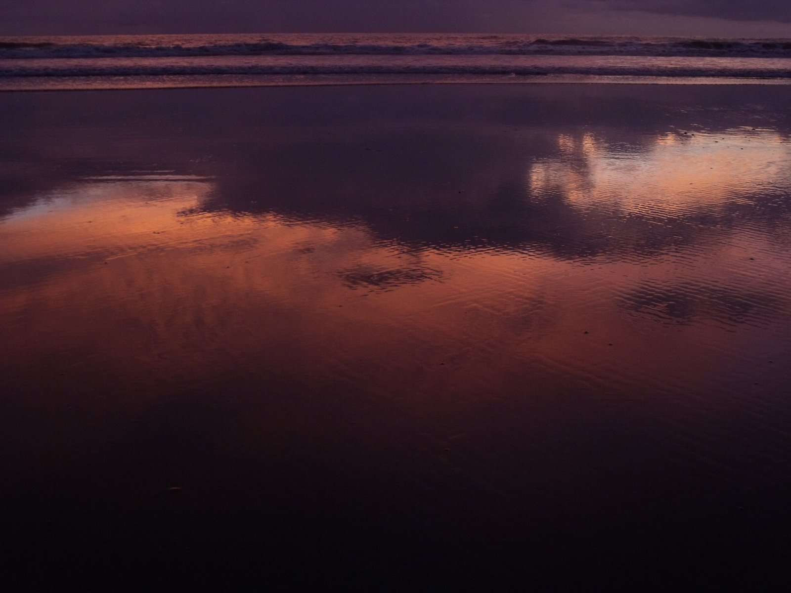 Ocean reflections of a Playa Ventanas sunset.